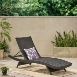 Wicker Patio Chaise Lounge With Adjustable Back, Poolside Sunbathing Chair With Foldable Legs, Waterproof Outdoor Chair -Christopher Knight Home